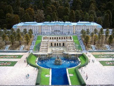 Featured is a photo of a 1/25 scale miniature re-creation of the Grand Peterhof Palace in St. Petersburg, Russia.  The Samson Fountain (with Samson prying open the jaws of the lion) can even be seen in the foreground.  The model is housed at Tobu World Square in Nikko, Japan, a theme park or "village" that houses world heritage sites in miniature.  So ... one must go not only to Nikko, but to St. Petersburg to see the magnificent Peterhof Palace in person. (This was the only way to get the whole site into a picture!) Photo is by Jiang Dong-Qin.